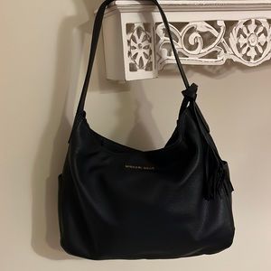 Navy Blue leather Michael Kors small Hobo Bag with matching wallet.